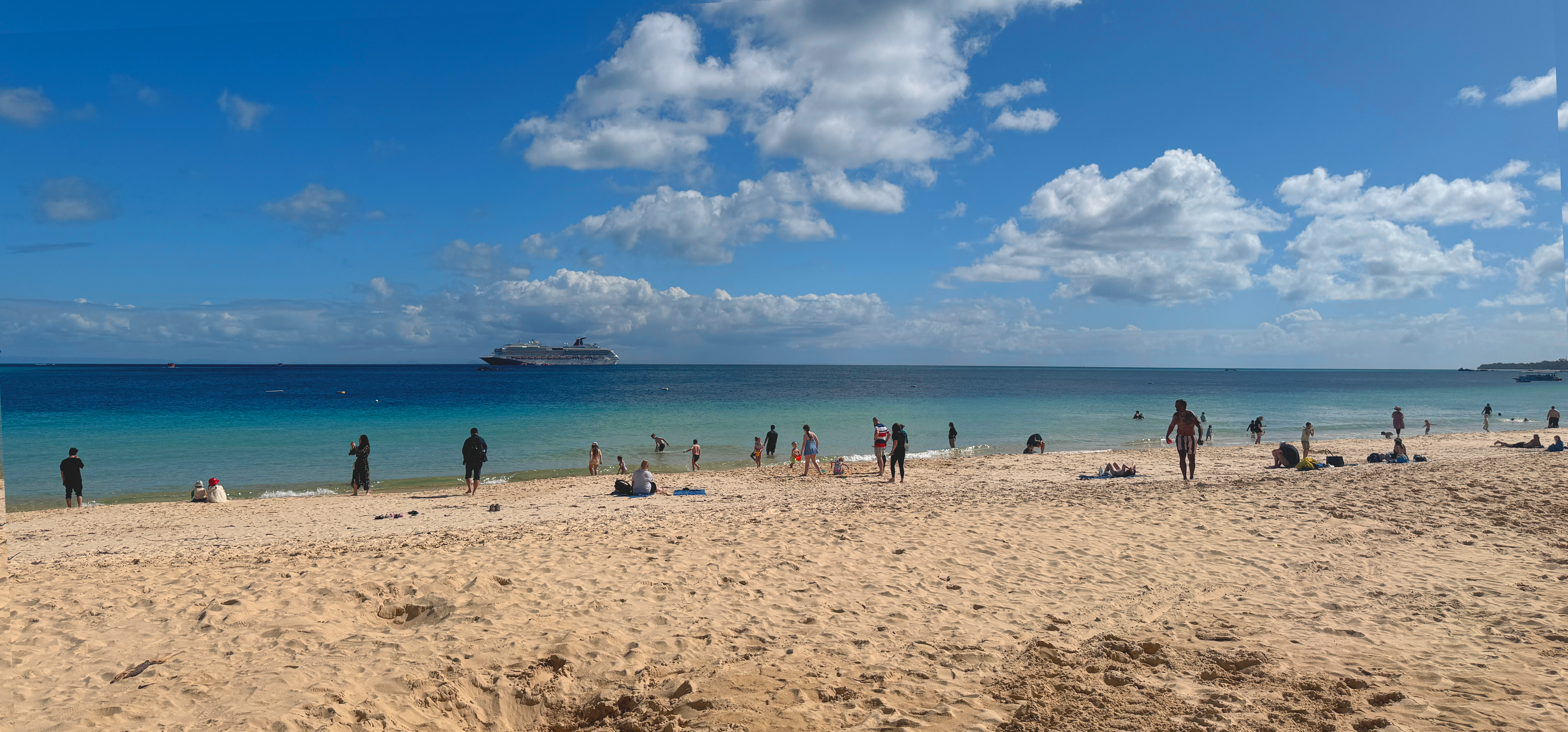 Tangalooma beach with pelicans on the jetty